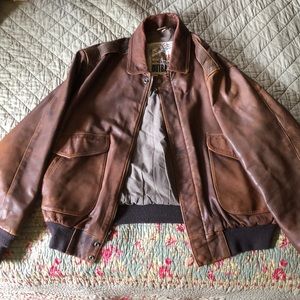 Large brown leather bomber jacket